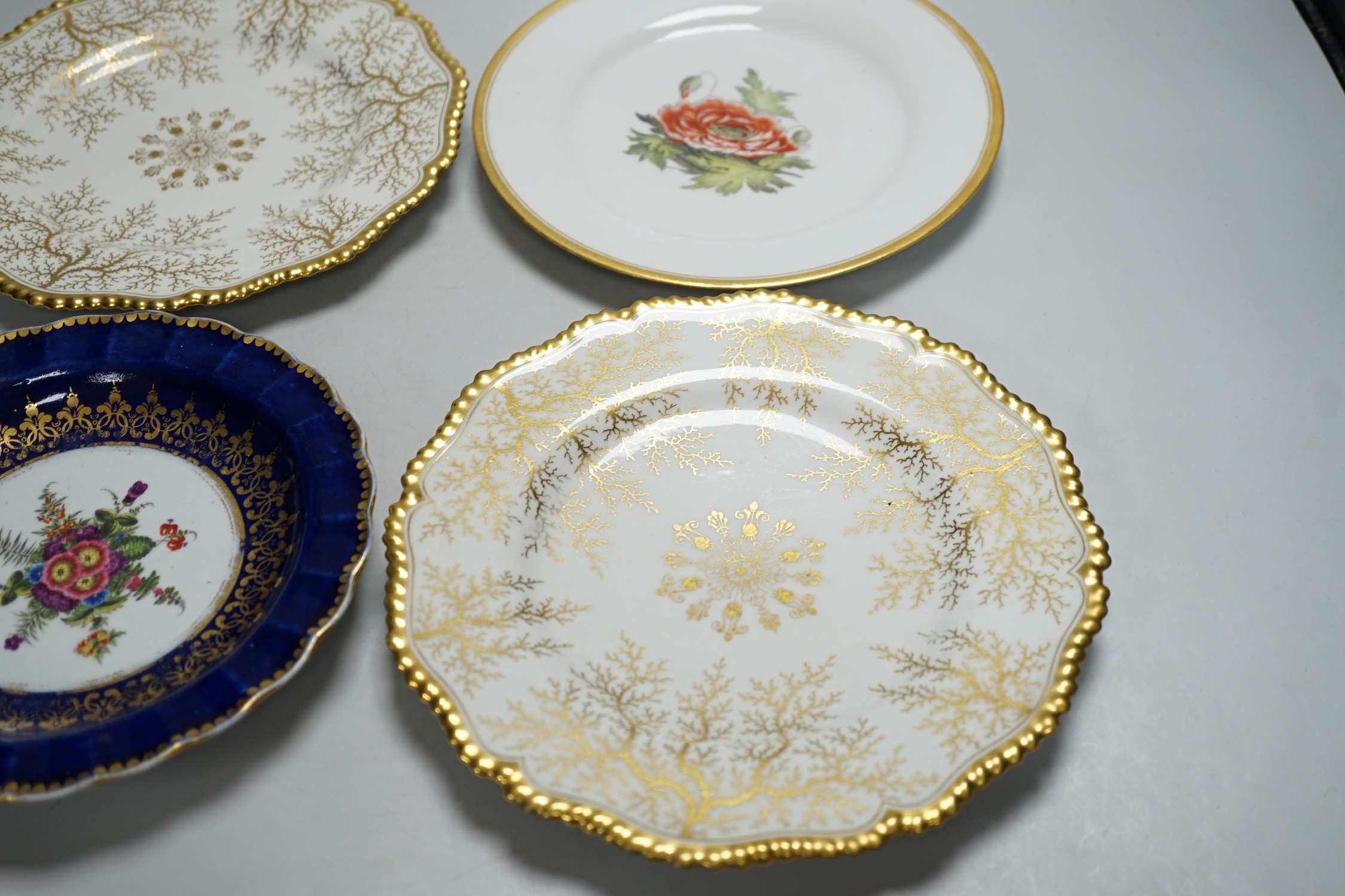 A Chamberlain's Worcester floral plate, and three Barr Flight & Barr plates, largest 22.5 cm